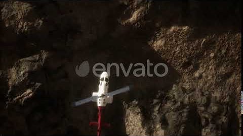 Slow Motion Helicopter Above Rocky Desert | Motion Graphics - Envato elements
