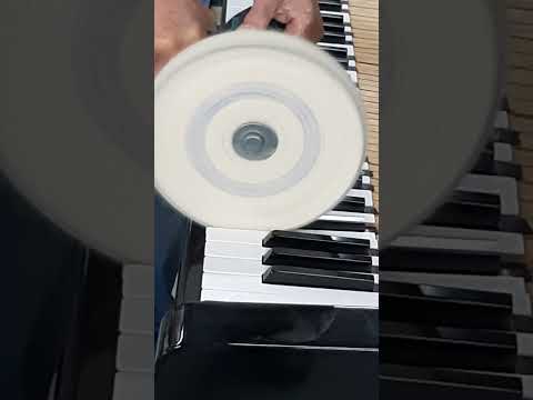 polishing piano keys