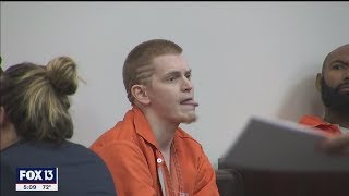 Former neo-Nazi, accused of killing roommates, appears to choke himself in court screenshot 1