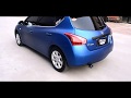 Nissan Tiida modified exhaust and wrapped blue Arlon