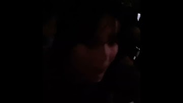 Billie Eilish hugging a fan and checking up on them during a show