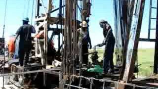 Workover Rig Runnings Rods Back In Oil Well Bryan Texas 2008