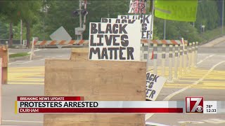 4 arrested after blocking off road in front of Durham police HQ