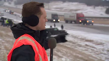 DFW ice storm: Trucks and jeeps help tow 18-wheelers that got stuck on ice along I-20. Unbelievable!