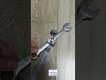 A specialized wrench extender bar featuring a long steel handle