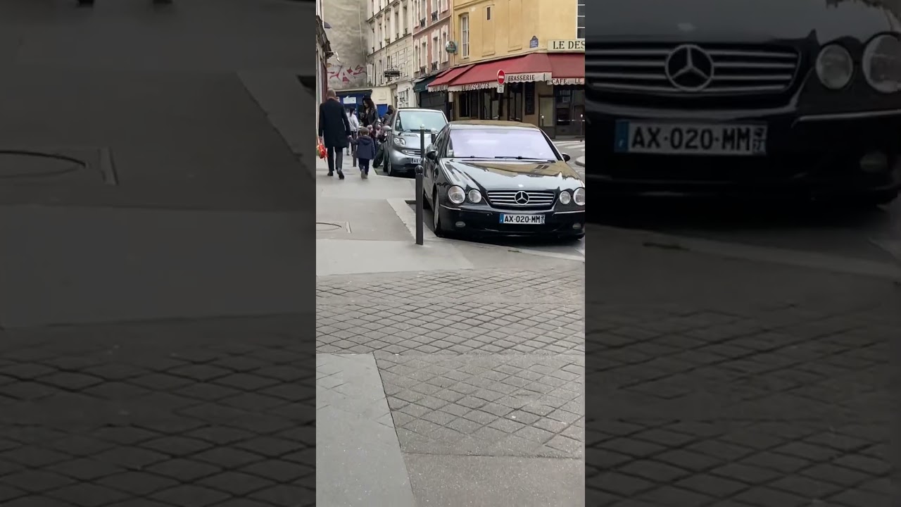 A CL DOWN THE STREET OVERFLOWING IN PARIS C215