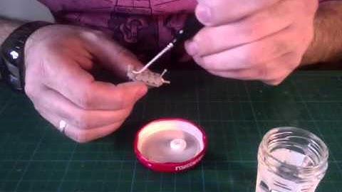 Aplication du Milliput avec pinceau.