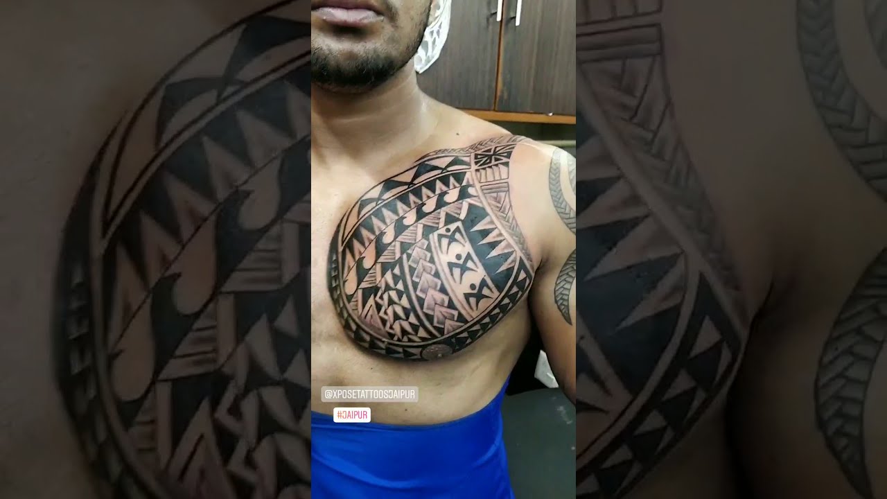Polynesian style full sleeve and chest tattoo