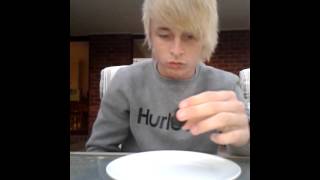 Snorting hot chilli sauce!