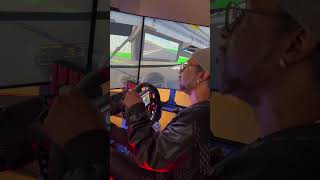 Katt Williams driving Joe Rogans racing simulator