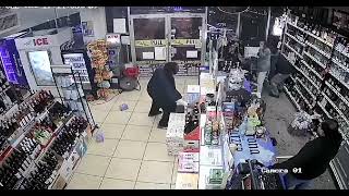 Liquor store customer fires bottles of red wine at employees