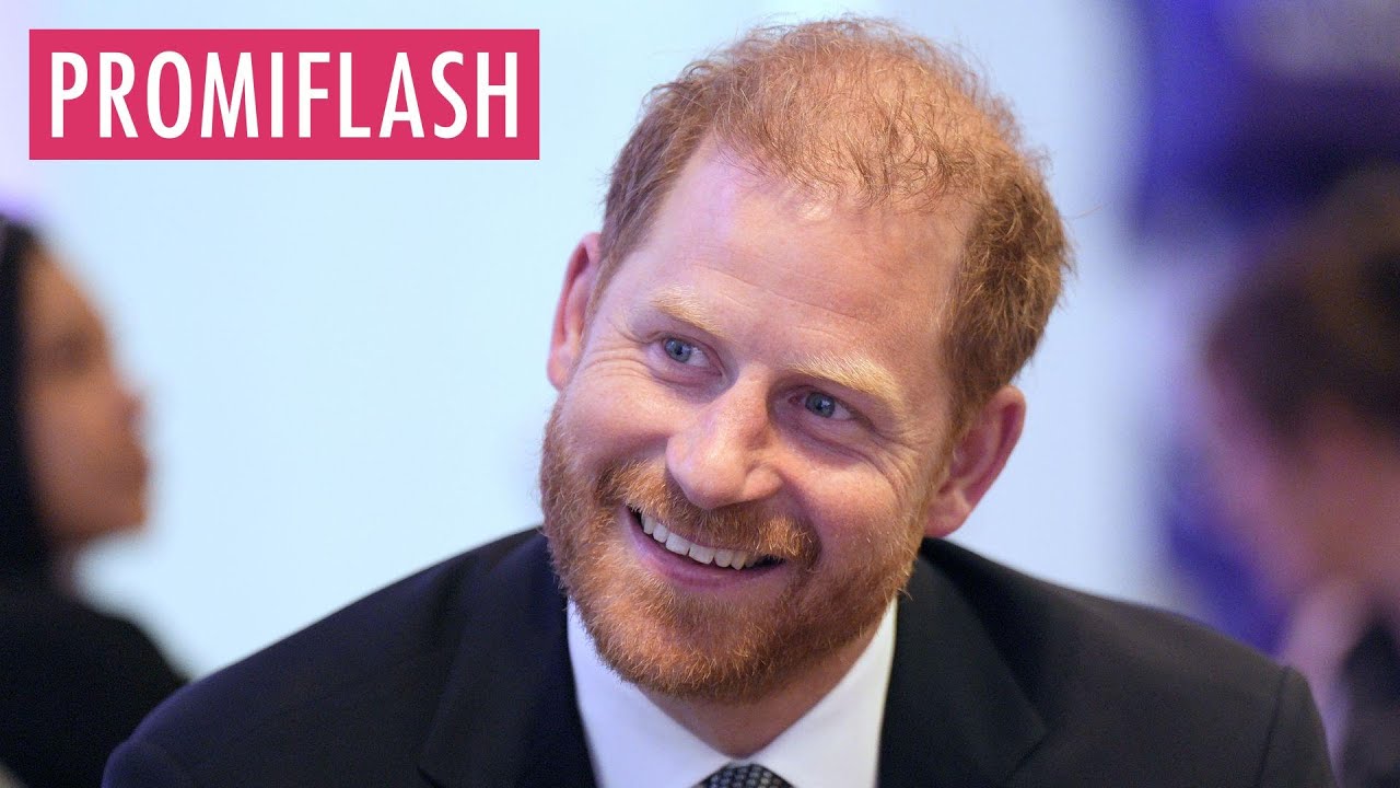 Nach Treffen mit Charles: Prinz Harry strahlt bei Empfang