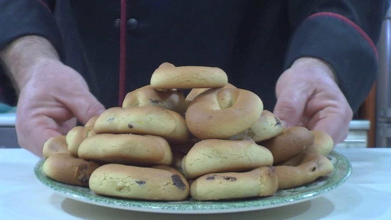 Τhecook.gr - Κουλουράκια πορτοκάλι νηστίσιμα με σταγόνες κουβερτούρας