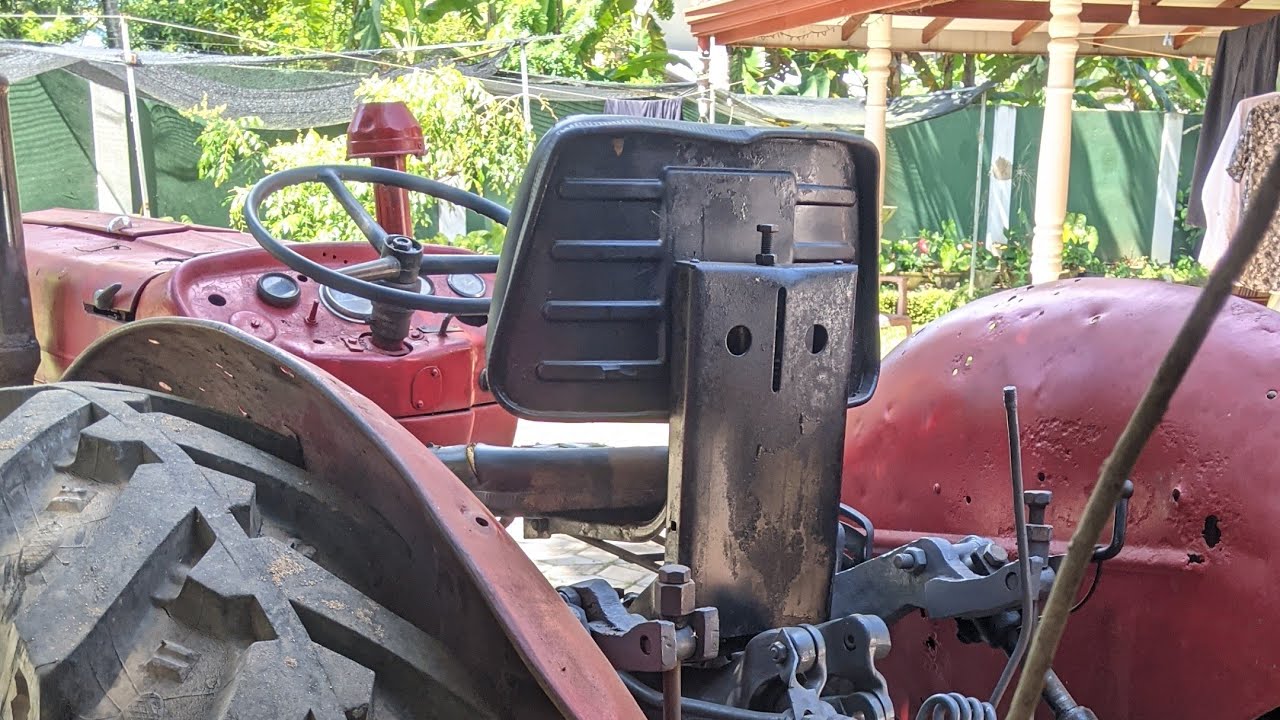 Messy 135 tractor work in road