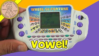 Spin The Wheel  Pick A Vowel How To Play The 2005 Hasbro Wheel Of Fortune Handheld Electronic Game