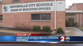 Crews clean schools amid flu concerns