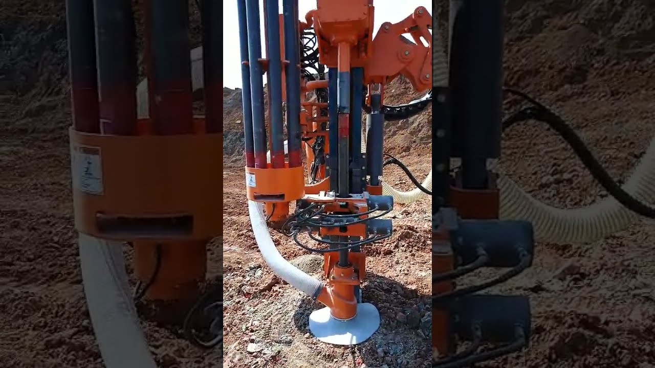 DTH drill rig is working with dust free device protect the workers and environment