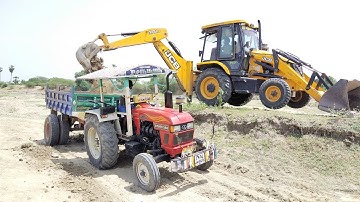 Eicher 548 Tractor fully loaded with trolley and 3dx JCB machine working in coming village