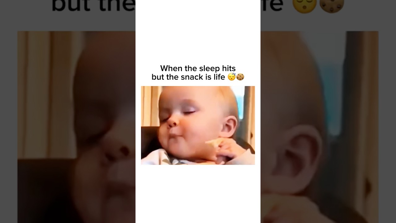 Baby can't choose between sleep and snack 😂💤