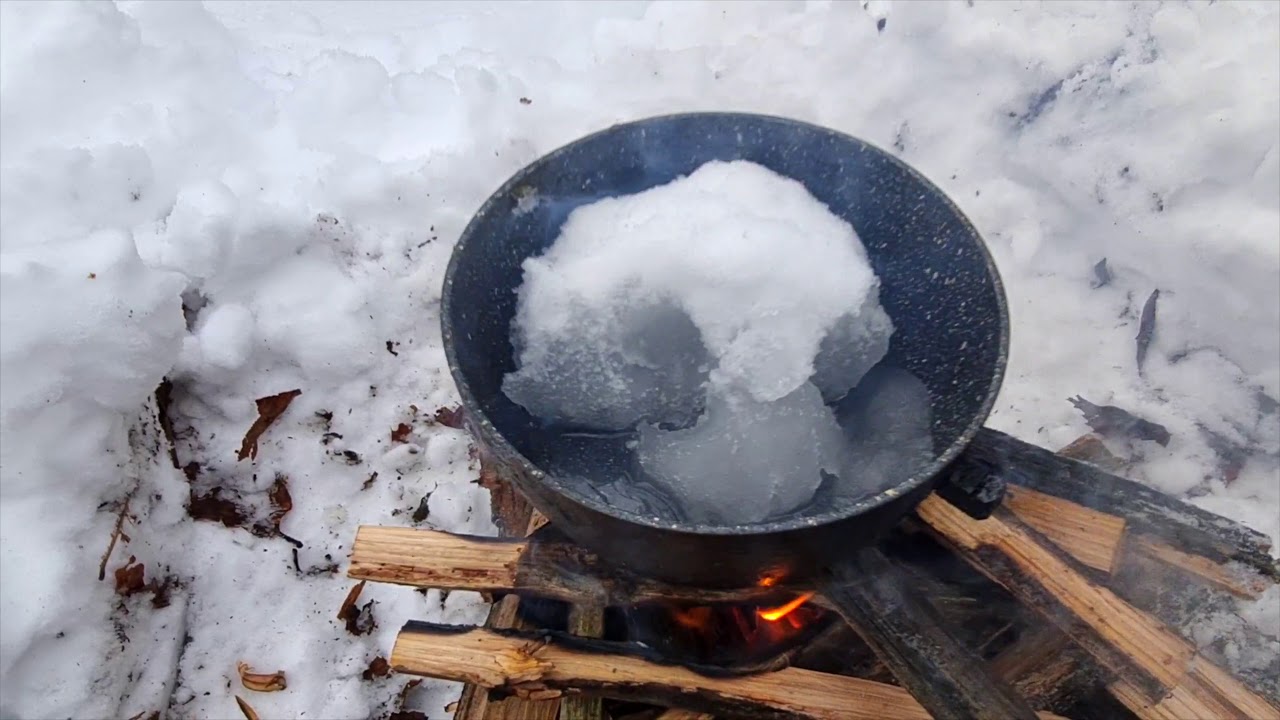 starting the fire and cooking in the snow and in freezing conditions ...
