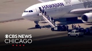 Navy technician charged with making false bomb threat on Hawaiian Airlines flight