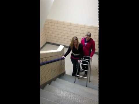 Ascending stairs with standard walker