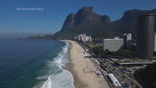 Volunteers clean Rio beach on Oceans Day