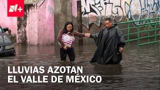 Lluvias colapsan el Valle de México; habitantes se emplayan los pies para cruzar inundaciones
