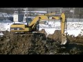 Cat 324D L and Komatsu PC228US