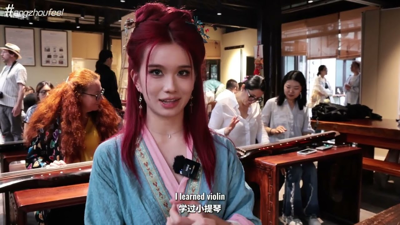 Internet sensation Sugar wows seekers in Hangzhou with impromptu guqin performance