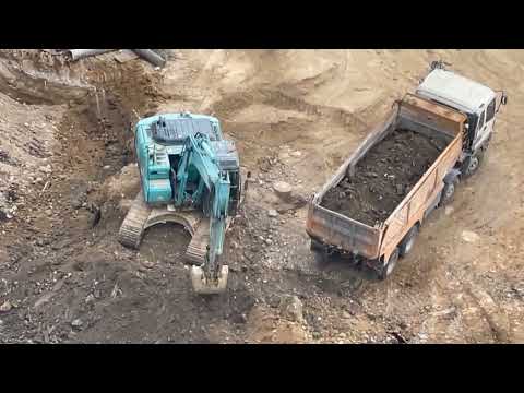 The Excavator cut & fill the construction area