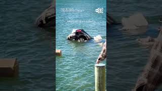 Quick-thinking bystanders rescue driver trapped in rapidly sinking SUV