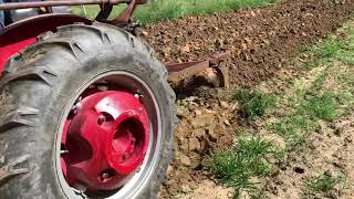 Farmall 140 Plowing