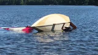Righting a capsized Alcort AMF MiniFish Sailboat