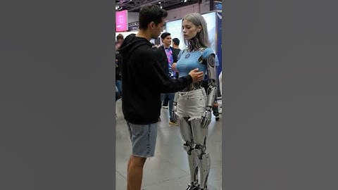 Guy Tries Out the Newest Girlfriend Robot at the Expo