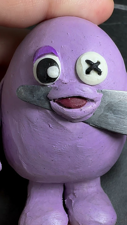 I made Grimace but he’s Rainbow friends #plasticine #sculpting #clay #grimace #roblox