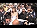 Crazy arrival for Bella Hadid at the Magnum Beach in Cannes
