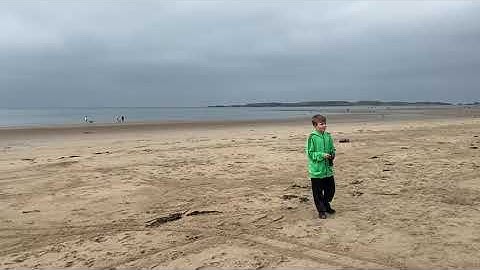Traxxas slash on the beach and climbing the sand dunes, with only 2wd but paddle tyres on.
