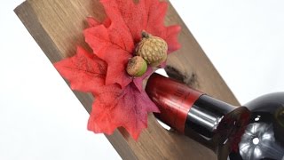 We built this balancing wine bottle holder as part of a contest for Pure Bond Wood (we were sent the wood). I added a fall theme to 