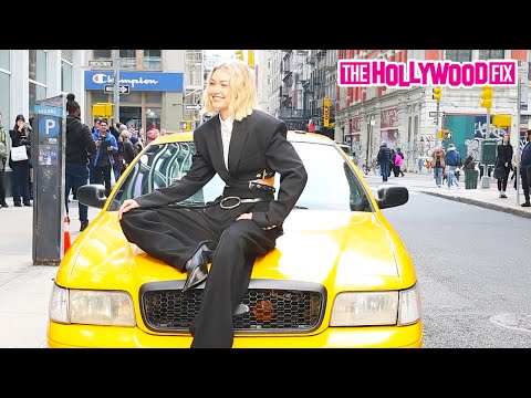 Gigi Hadid Models On The Hood Of A Taxi Cab For Her New Maybelline Makeup Commercial In New York, NY