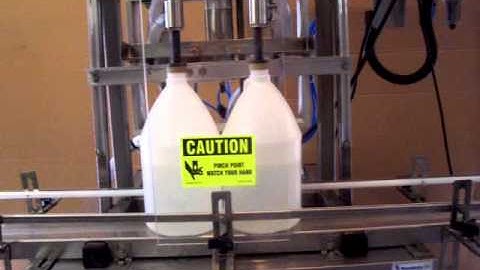 2 head overflow filling machine mounted on a cart