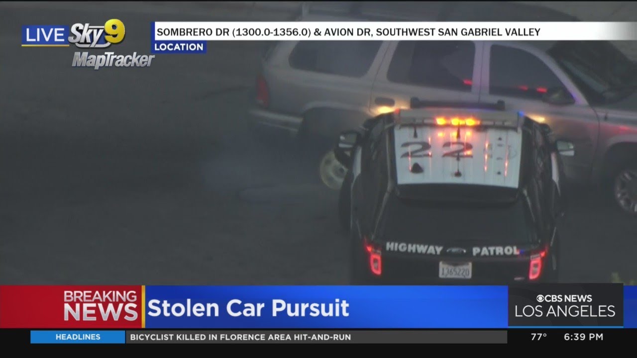 Stolen Car pursuit suspect continues to keep foot on gas - YouTube
