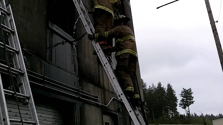 Smith & Mcferon ladder with charged hose.MOV