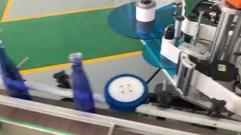 Automatic round bottle labeling machine with date coder