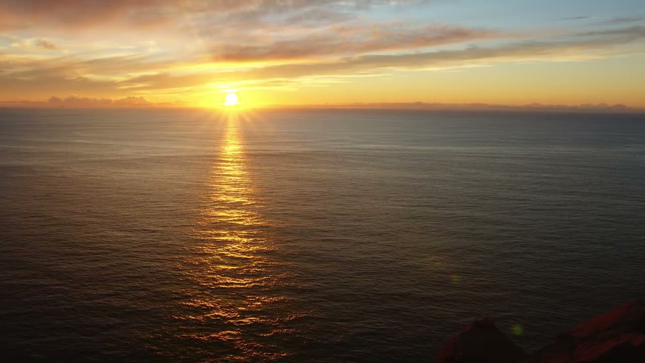 Beautiful sunset in the Atlantic Ocean at Cape Cabo Da Roca, Portugal. Westernmost point of Europe