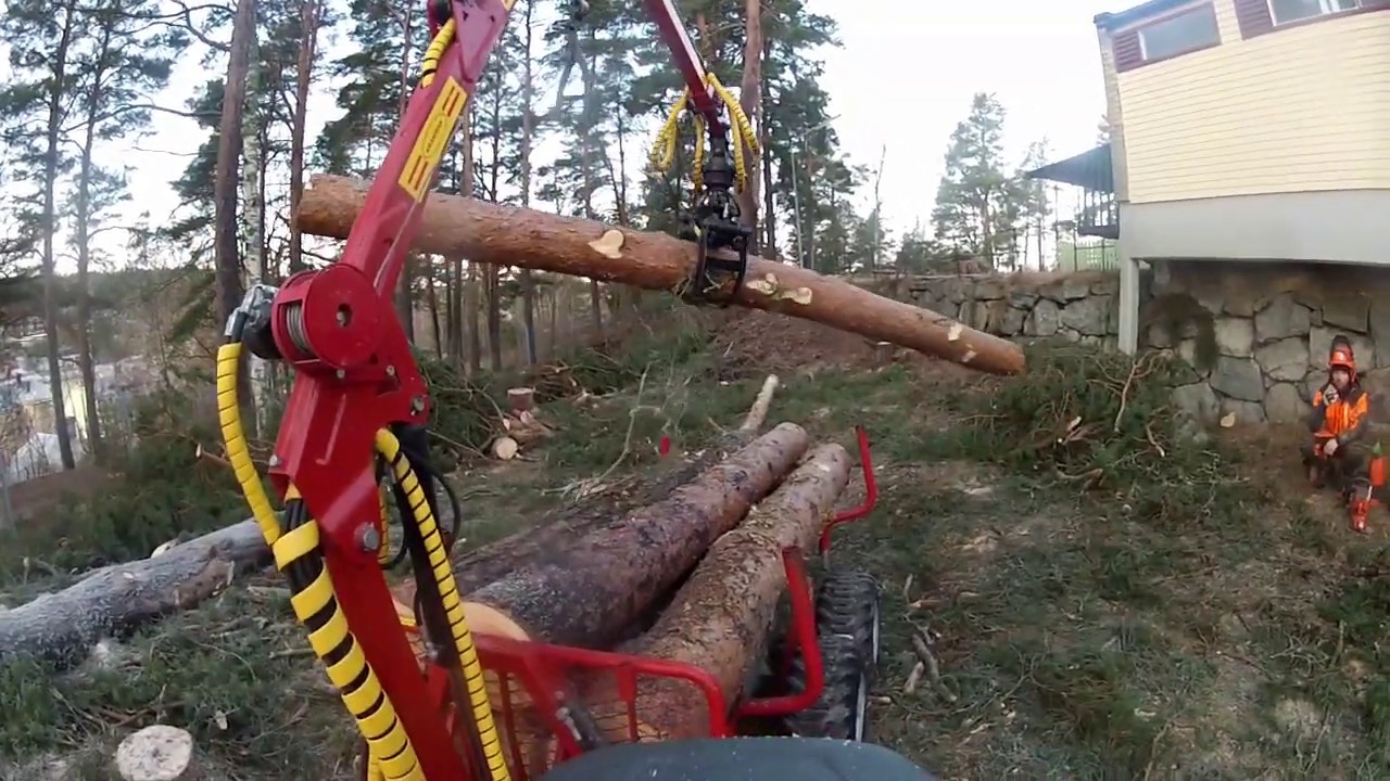 Kranman T-1900e, On/Off loading pineloggs.