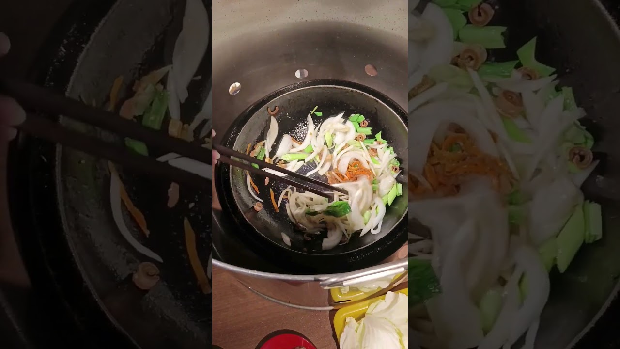 石頭火鍋爆香一定要有乾魷魚蔥蒜跟洋蔥，最後加入麻油整個味道就很香，台北40年老牌石頭火鍋|雅香石頭火鍋延吉店 縮圖