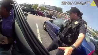 Harrowing body camera footage and 911 call after child rescued from backseat of stolen car