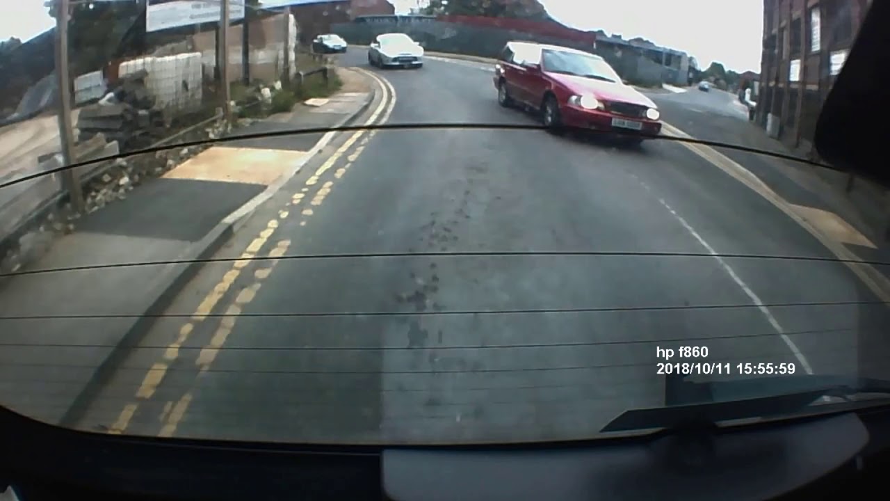 Near miss with a red Volvo - YouTube