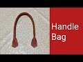 Rolled handle bag dari bahan kulit sintetis